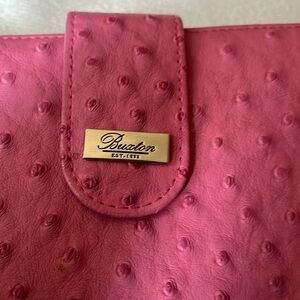 Buxton pink wallet. Embossed, lots of card slots and inside pockets.